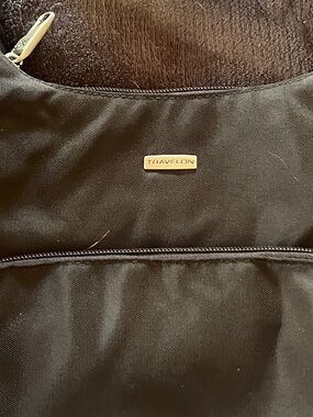 Travelon Black Crossbody Sling Bag with Light Gray Interior